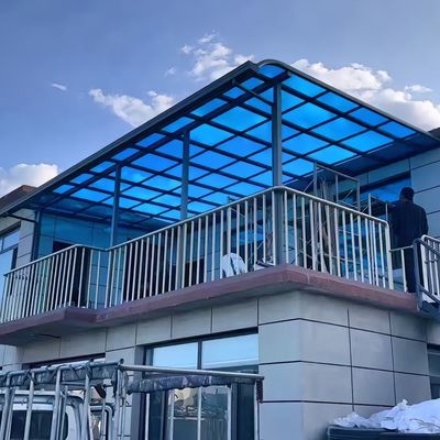 Toldo de policarbonato DIY con marco de aluminio y cubierta de lámina sólida azul para hogares y edificios comerciales